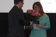 Wręczanie kwiatów laureatce - dr arch. Annie Lorens