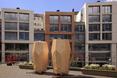 Bryły na tle trochę większej architektury współczesnej - rezydencje mieszkalne dla pszczół w Oslo autorstwa pracowni architektonicznej Snøhetta