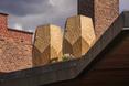 Inspiracją dla formy brył był plaster miodu - rezydencje mieszkalne dla pszczół w Oslo autorstwa pracowni architektonicznej Snøhetta