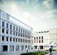 Biała bryła nowego budynku, kolegium św. Hildy, Oksford. Konkurs architektoniczny