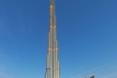 Odbicie wieżowca Burj Khalif w wodzie potęguje jego niesamowity wygląd